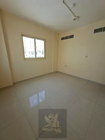 The Most Beautiful 2BR Apartment in Al Musalla | Living Room | Central AC1600