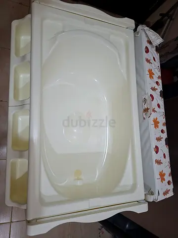 Baby changing table with built-in bathtub and storage - used