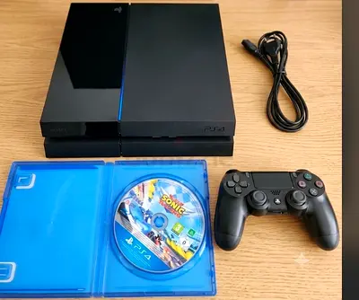 Playstation 4 Disc Edition with original controller and Sonic game