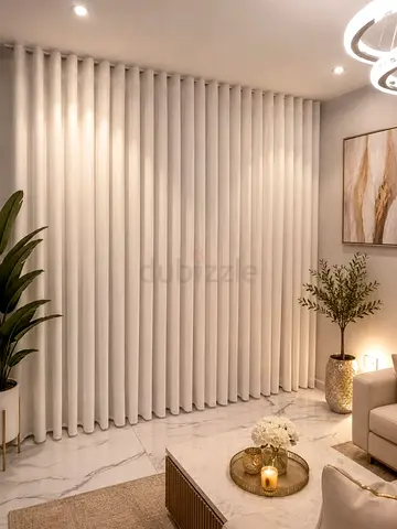 white floor-to-ceiling fabric curtains