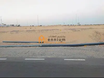 A prime commercial plot for sale in Al Raqibah/Al Seyouh Suburb—the most sought-after area for investment among land options in Sharjah.
