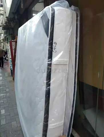 Almost-new Queen Size Mattress — Good Condition, Clean & Wrapped