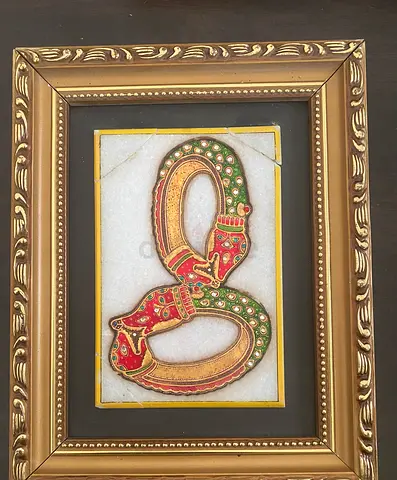 Framed hand ornament painting on marble by Indian artist.