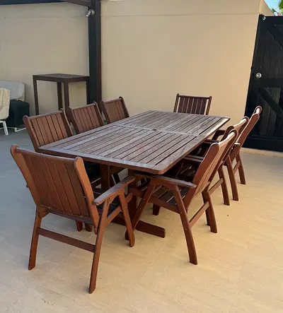 Solid wood outdoor set, spacious table, 8 armchairs, family-size.