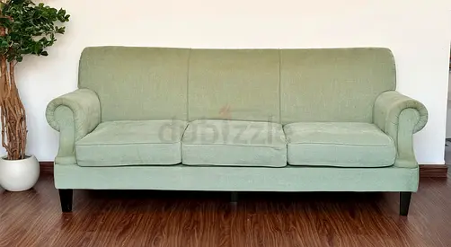 Light green 3-seater fabric sofa in good condition