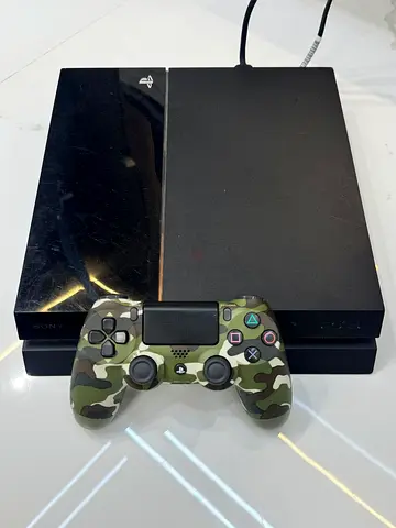 Sony PS4 Fat + Original DualShock 4 Controller – AED 450