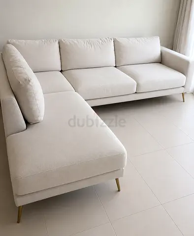 Light beige L-shaped fabric corner sofa with chaise, good condition