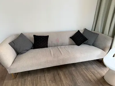 Light grey 3-seater fabric sofa with cushions