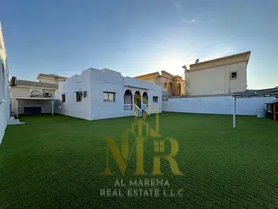 An exceptional opportunity in Al Rawda 2 – Ajman | 10,000 sq. ft. villa | 5 master bedrooms | Rooftop terrace | Electricity, water, and A/C included |