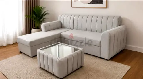 Light grey L-shaped fabric sofa with storage ottoman - excellent condition
