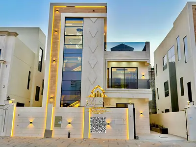 فيلا فاخرة للبيع في **الحليو – عجمان**، بتصميم معماري عصري وتشطيبات Ultra-Luxury، في موقع استراتيجي قريب من المسجد ومركز شرطة الحليو الشامل والخدمات ا