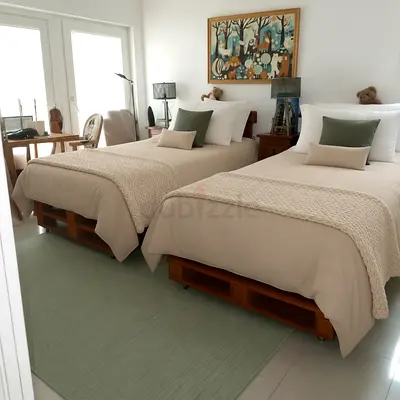 Pair of Single Wooden Bed Frames with Headboards and Mattresses made of wooden palette with wheels