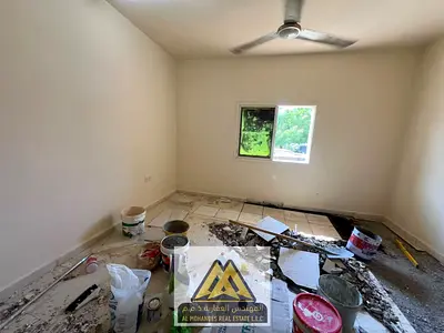 A spacious studio apartment in Al Mowaihat 2, Ajman, located in a prime location close to Sheikh Ammar Street. The property features a separate kitche