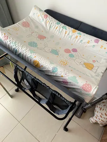Baby changing table with padded changing mat and storage organizer - good condition