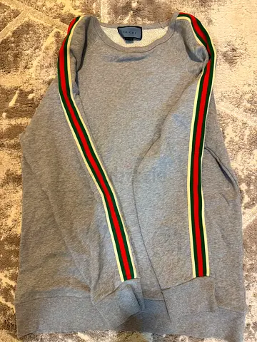 Grey sweatshirt with red-green striped trim, size M