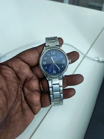 Titan stainless steel men's wristwatch with blue dial - used