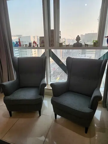 Pair of grey wingback armchairs - very good condition