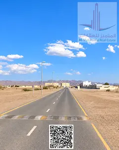 Residential Commercial Land for Sale in Manama 14 Ajman 3,229 Sq Ft Two Roads Freehold G+1 Permissio