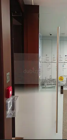 Premium-quality glass office door in excellent condition, installed