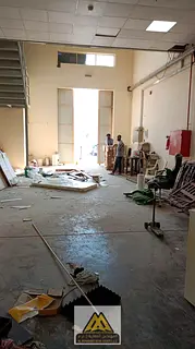 warehouse in a prime location in Al Jurf Industrial Area 1, behind the Chinese market, suitable for