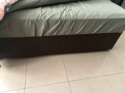 Simple dark brown base mattress in good condition