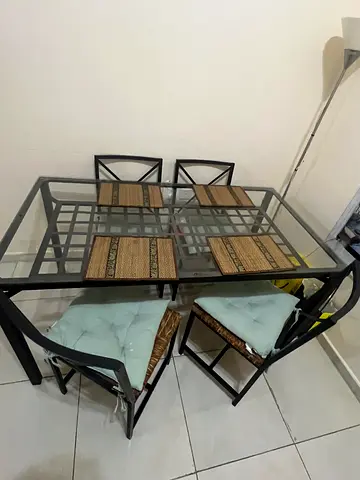 Metal and Glass 4-Seater Dining Table with Cushioned Chairs