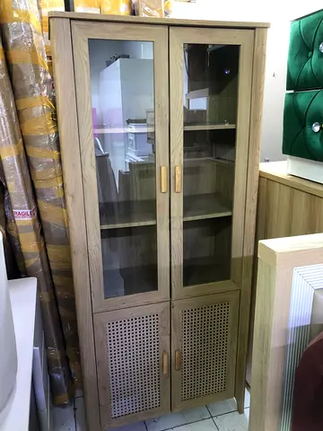 Wooden display cabinet with glass doors and storage - good condition