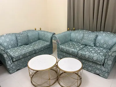 Light blue patterned 2-piece sofa set with nesting round coffee tables