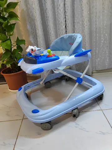 Baby musical walker foldable adjustable big size Good condition neat and clean price 45