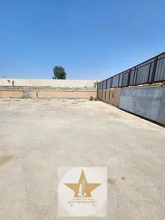 Prime Industrial Open Yard | 20,000 Sq. Ft. Fully Fenced Plot with Office & Facilities for 349K AED
