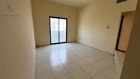 A one-bedroom apartment with a living room and balcony is available for annual rent at an attractive