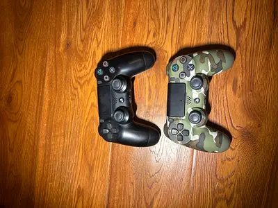 Dual Sony PS4 Controllers - One Black, One Camo (Great Condition)
