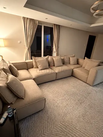 Large L-shaped modular beige fabric sofa — comfortable 6-seater