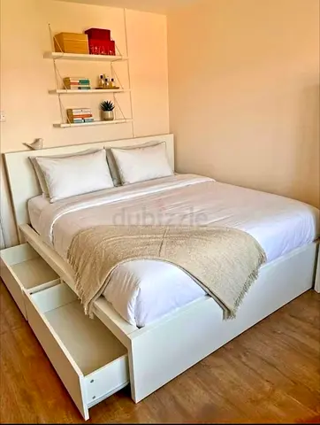 Ikea king size bed with mattress and storage drawers