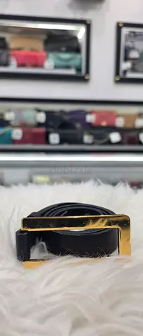 Black leather belt with gold rectangular buckle - gently used