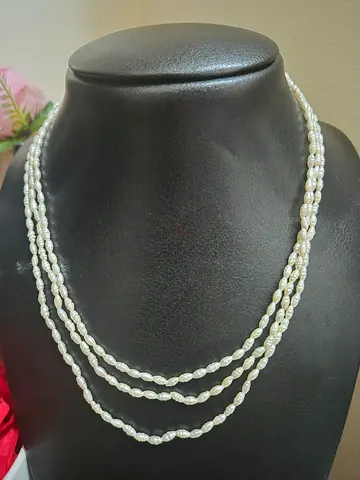Three-strand freshwater pearl necklace, classic white pearls