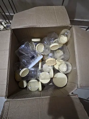 Box of Bpa free storage bottles (multiple pieces)