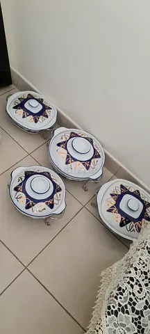 Porcelain serving dishes set with metal stand