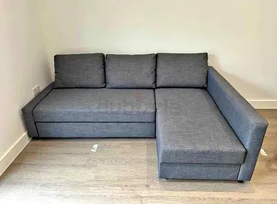Grey L-shaped Sofa Bed with Storage — Good Condition