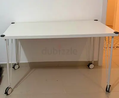 White IKEA-style rolling study table - good condition 120 X 60 cm