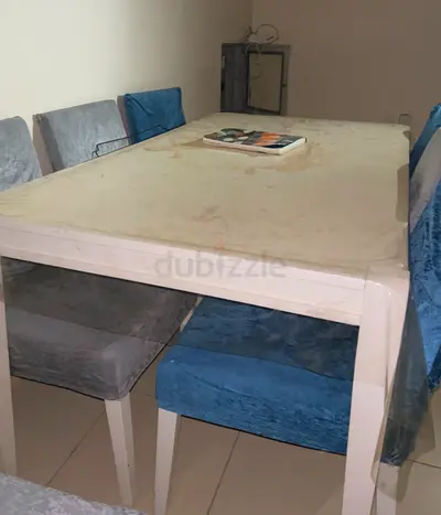 Used white dining table with 6 velvet chairs - needs cleaning