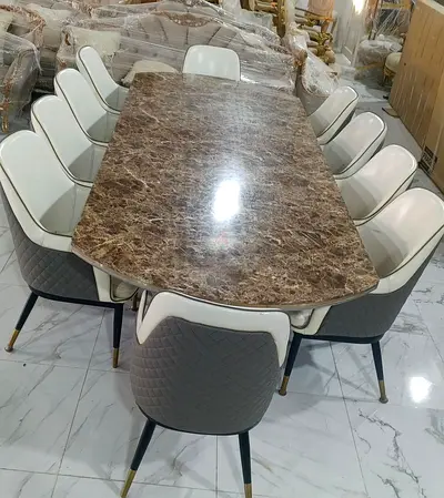 Marble-top dining table with 8 upholstered chairs - excellent condition