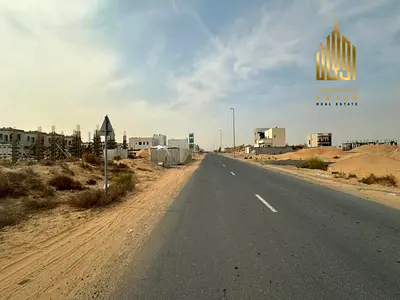أرض سكني زاوية شارعين، أمام الحديقة شامل الرسوم