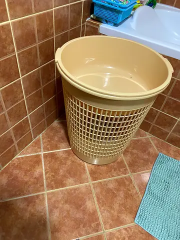 Used plastic laundry basket / hamper - beige, good condition
