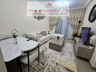 Two-bedroom apartment with a living room for monthly rent in Sharjah.