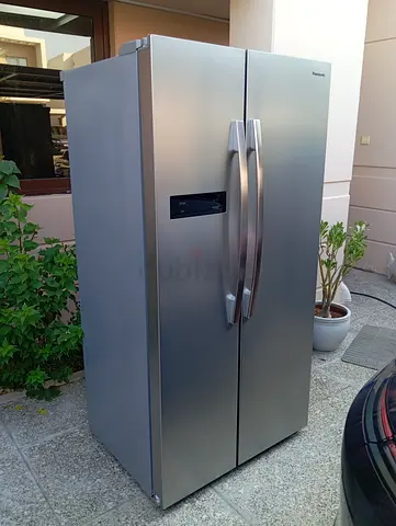 Side-by-side stainless steel refrigerator, good condition