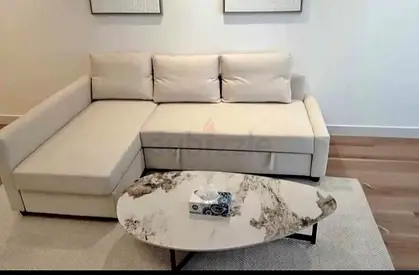 Beige L-shaped Sofa with Storage - Good Condition