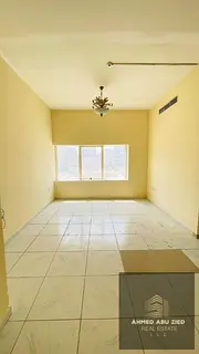 Annual 2BHK apartment for rent in Ajman Corniche, 2 bathrooms, master rooms, central AC, second row