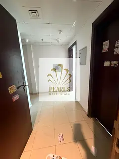 Finest 2BHK apartment in City Tower featuring 2bathrotcoms 2 balconies, a closed kihen, free parking