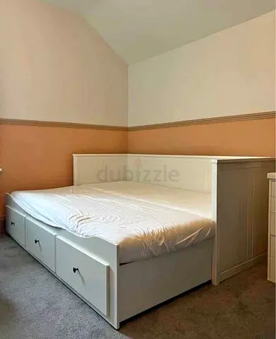 IKEA Hamnes day bed with 2 mattress and 3store drawers underneath is available excellent condition
